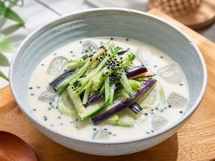 Chilled Korean soy milk soup with tender eggplant, cucumber, perilla oil, and black sesame